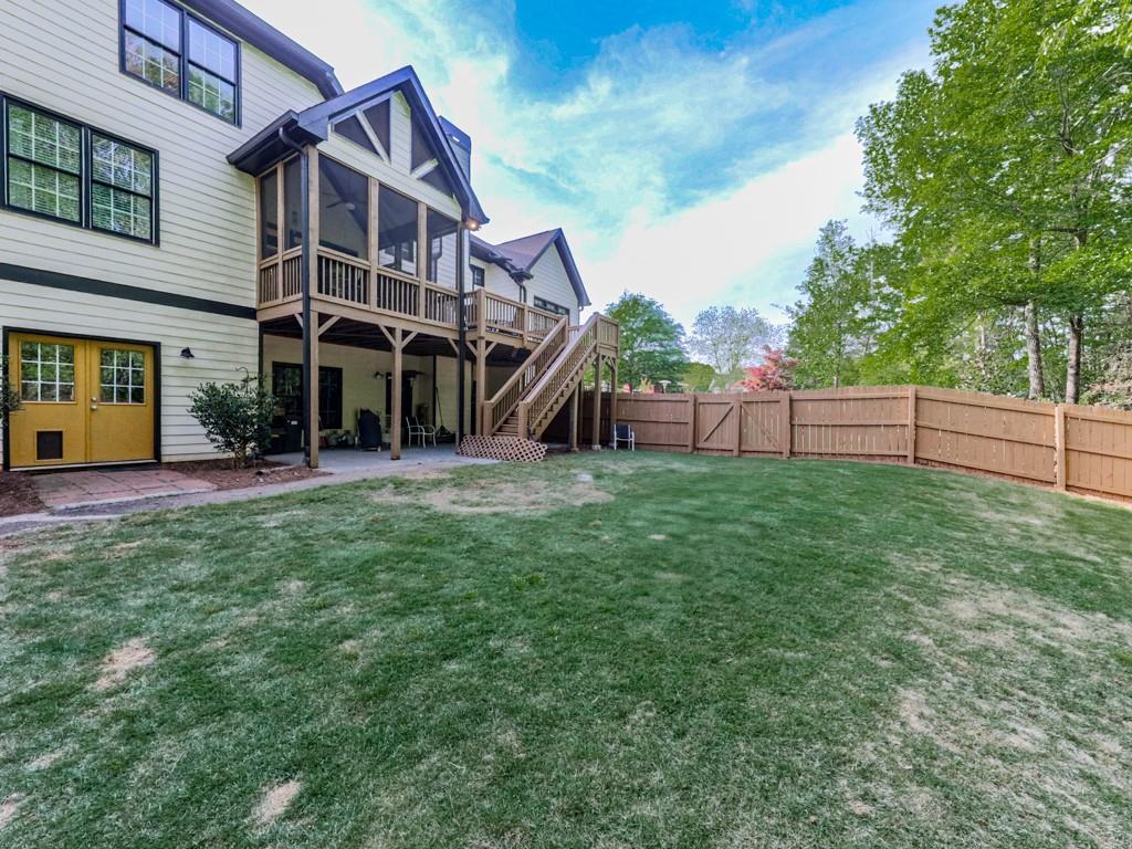 1076 Pinyan Lane Canton, GA 30115 - Photo 56 of 71 a view of a house with backyard and porch