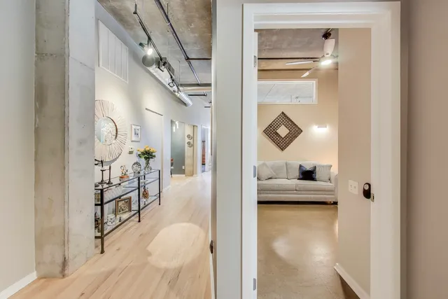 a workspace with furniture and a window