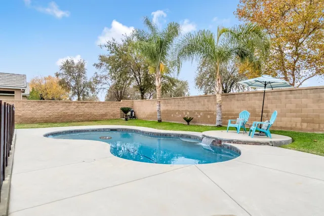 a view of a house with backyard porch and patio