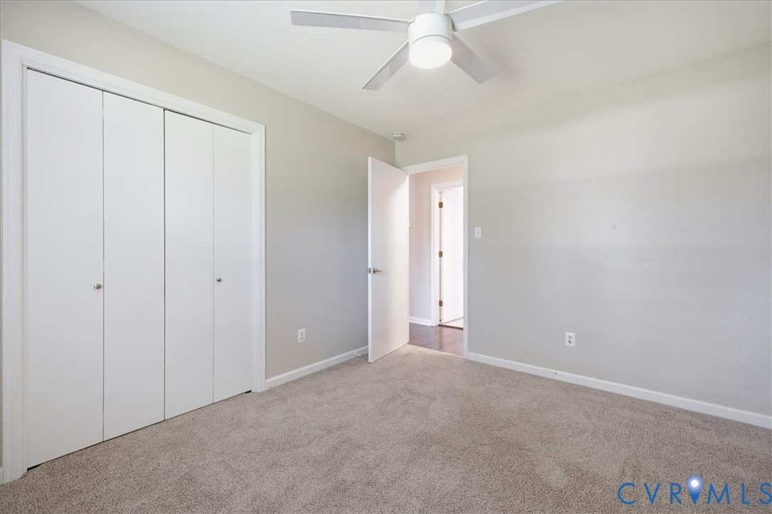 404 Bermuda Hundred Road Chester, VA 23836 - Photo 20 of 37 Neutral-toned walls complement the light-colored c