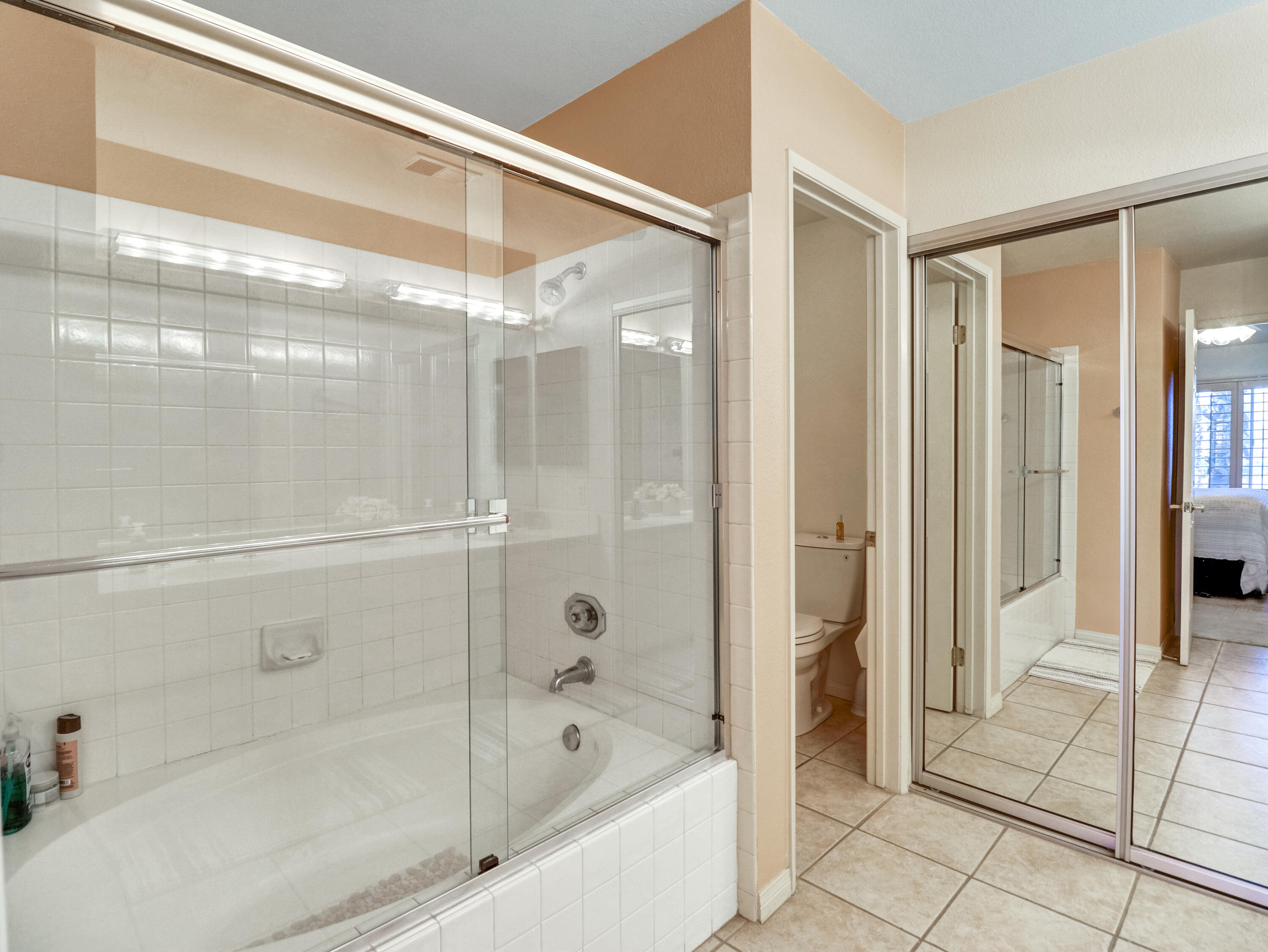 55393 Winged Foot La Quinta, CA 92253 - Photo 22 of 29 a bathroom with a bathtub and a shower