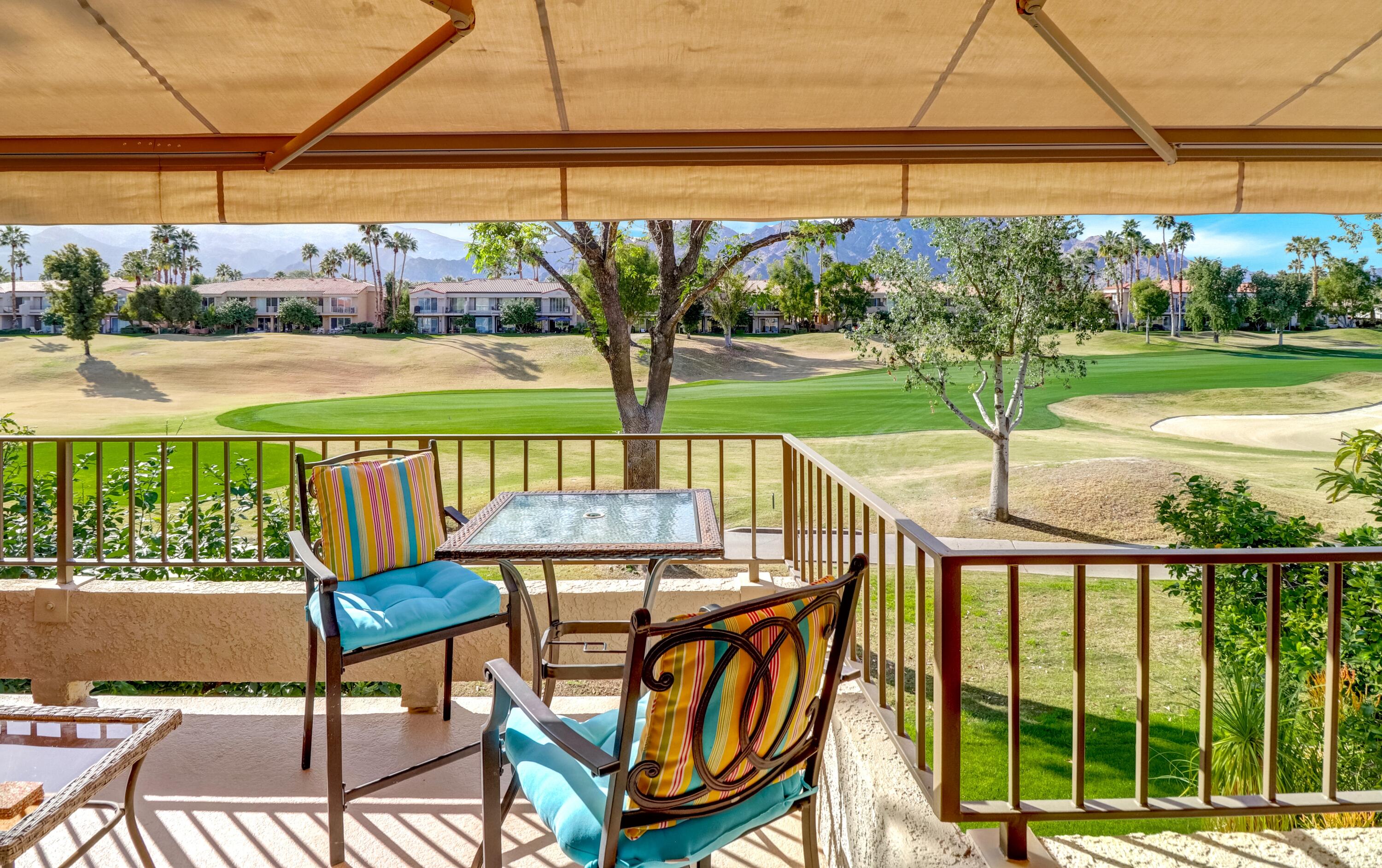 55393 Winged Foot La Quinta, CA 92253 - Photo 24 of 29 a view of a patio with a table & chairs