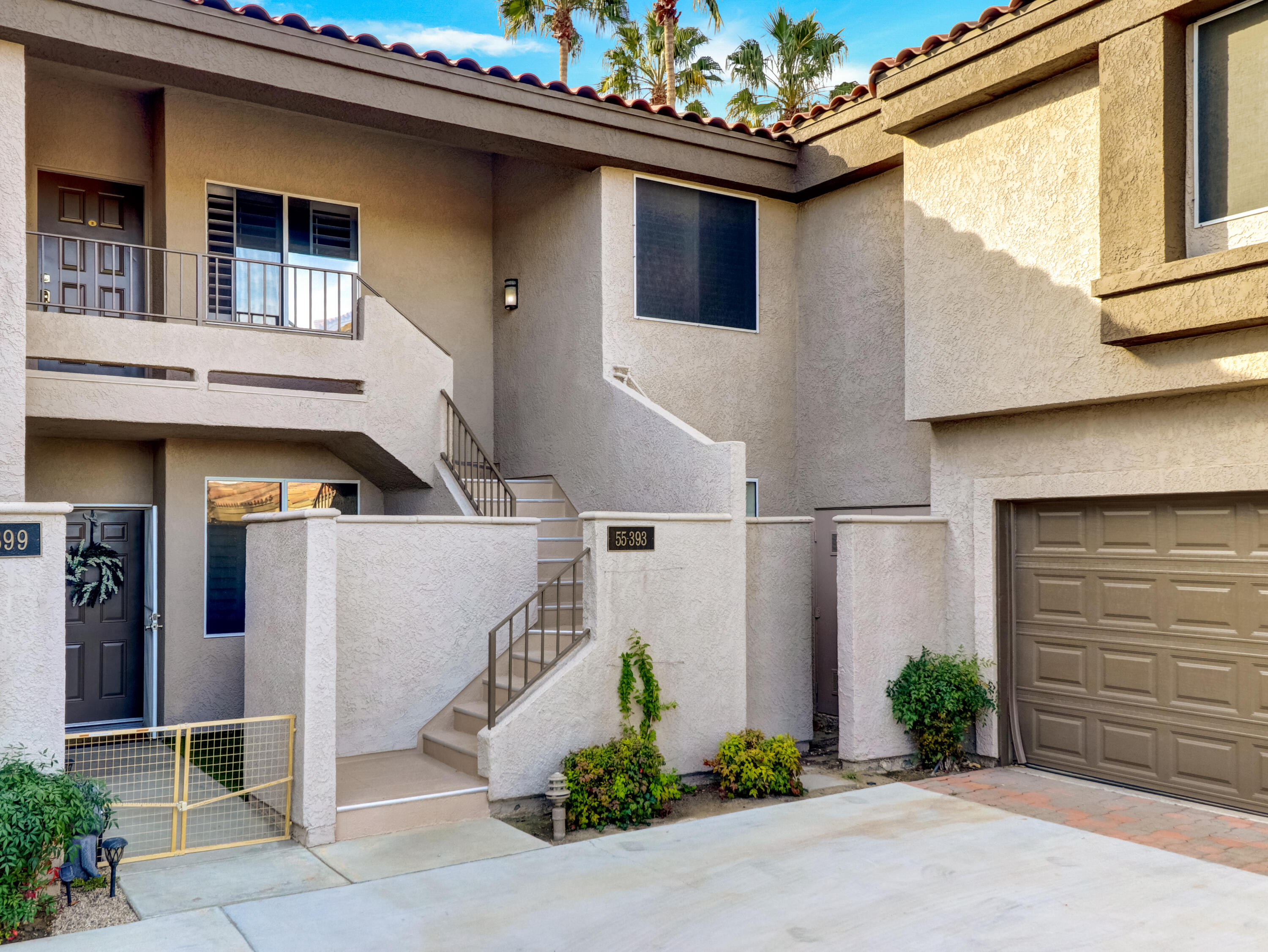 55393 Winged Foot La Quinta, CA 92253 - Photo 27 of 29 a front view of a house with garden