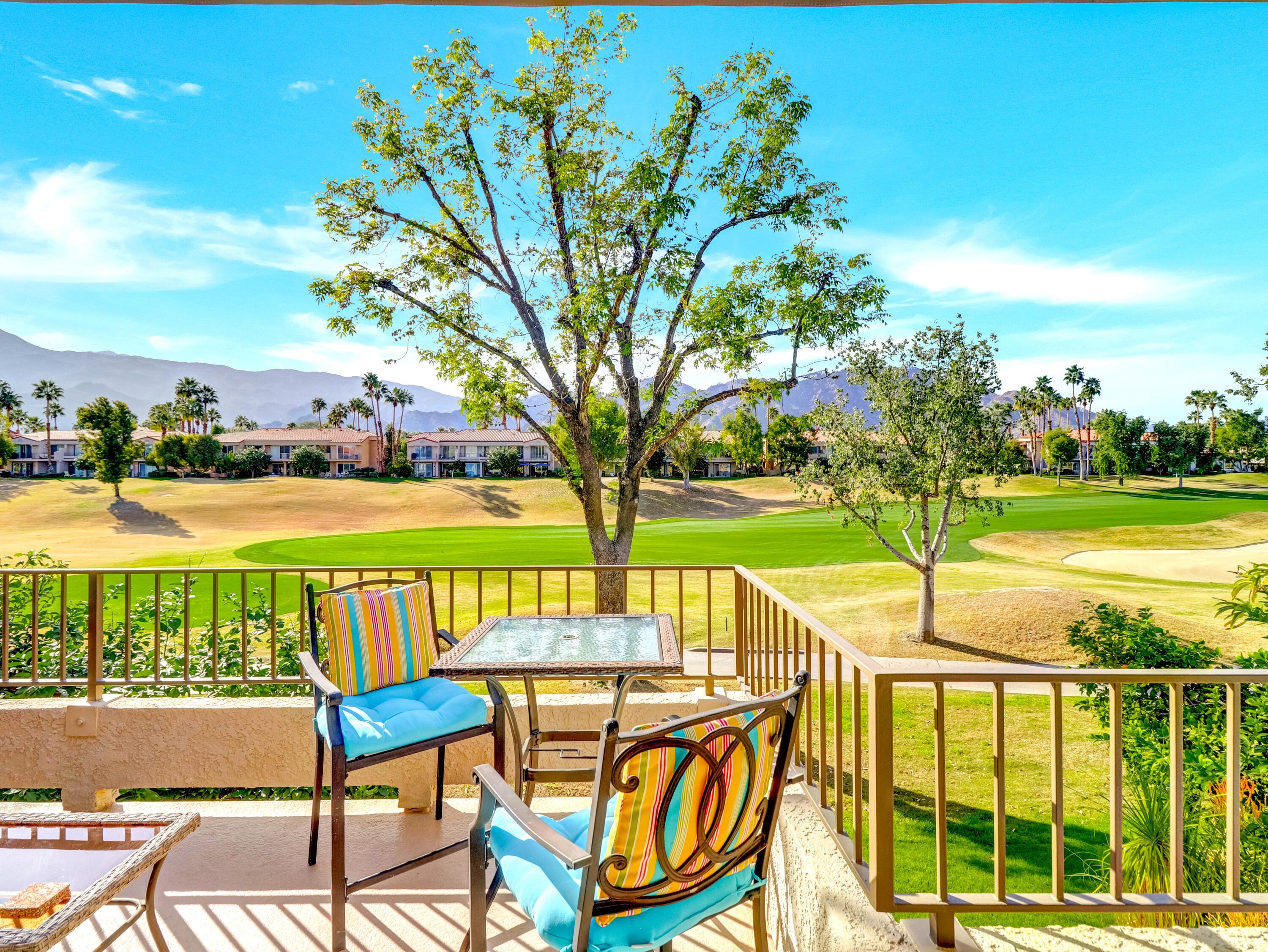 55393 Winged Foot La Quinta, CA 92253 - Photo 3 of 29 a view of a swimming pool with a patio and a yard