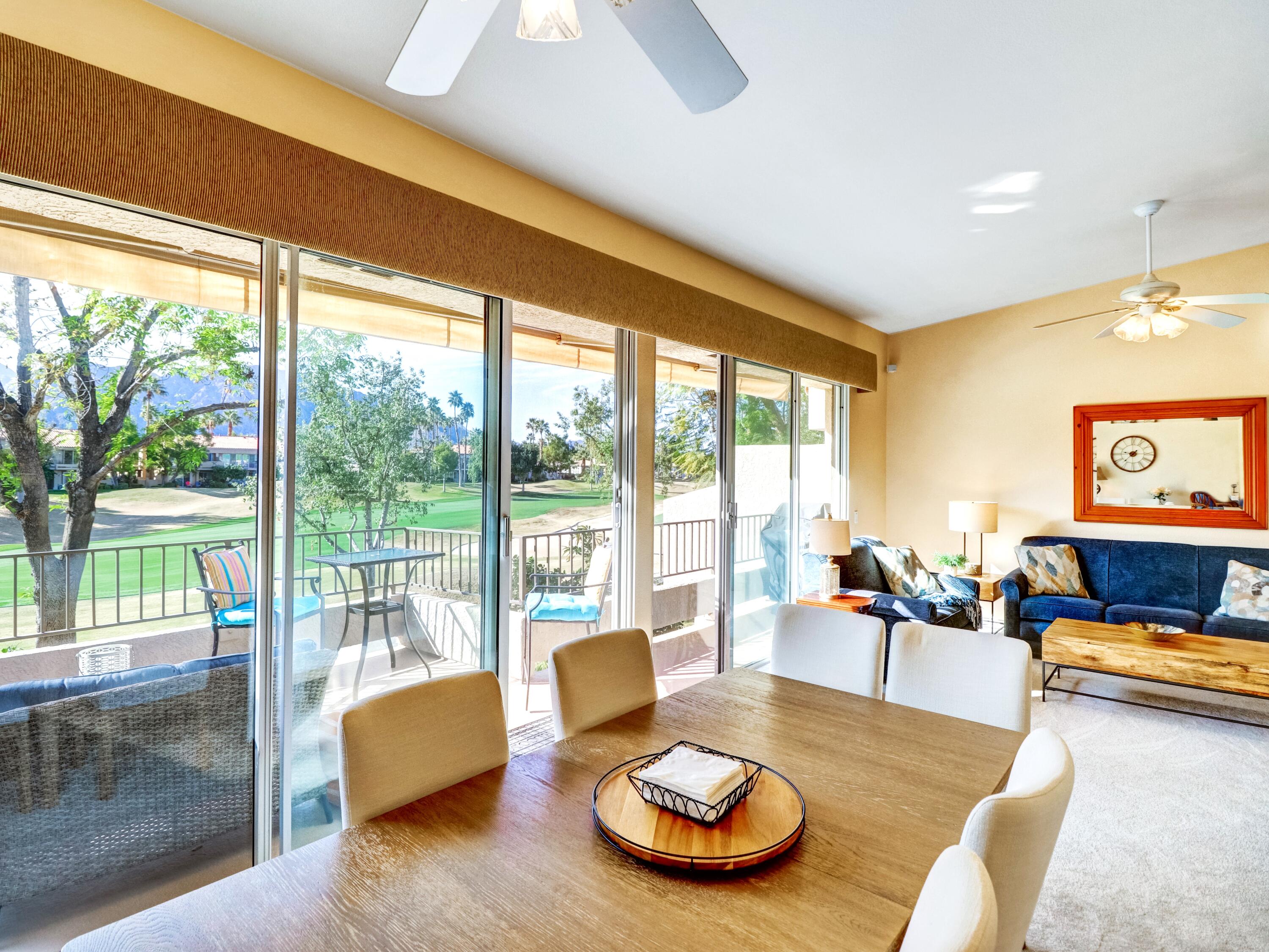 55393 Winged Foot La Quinta, CA 92253 - Photo 5 of 29 a living room with furniture and a large window
