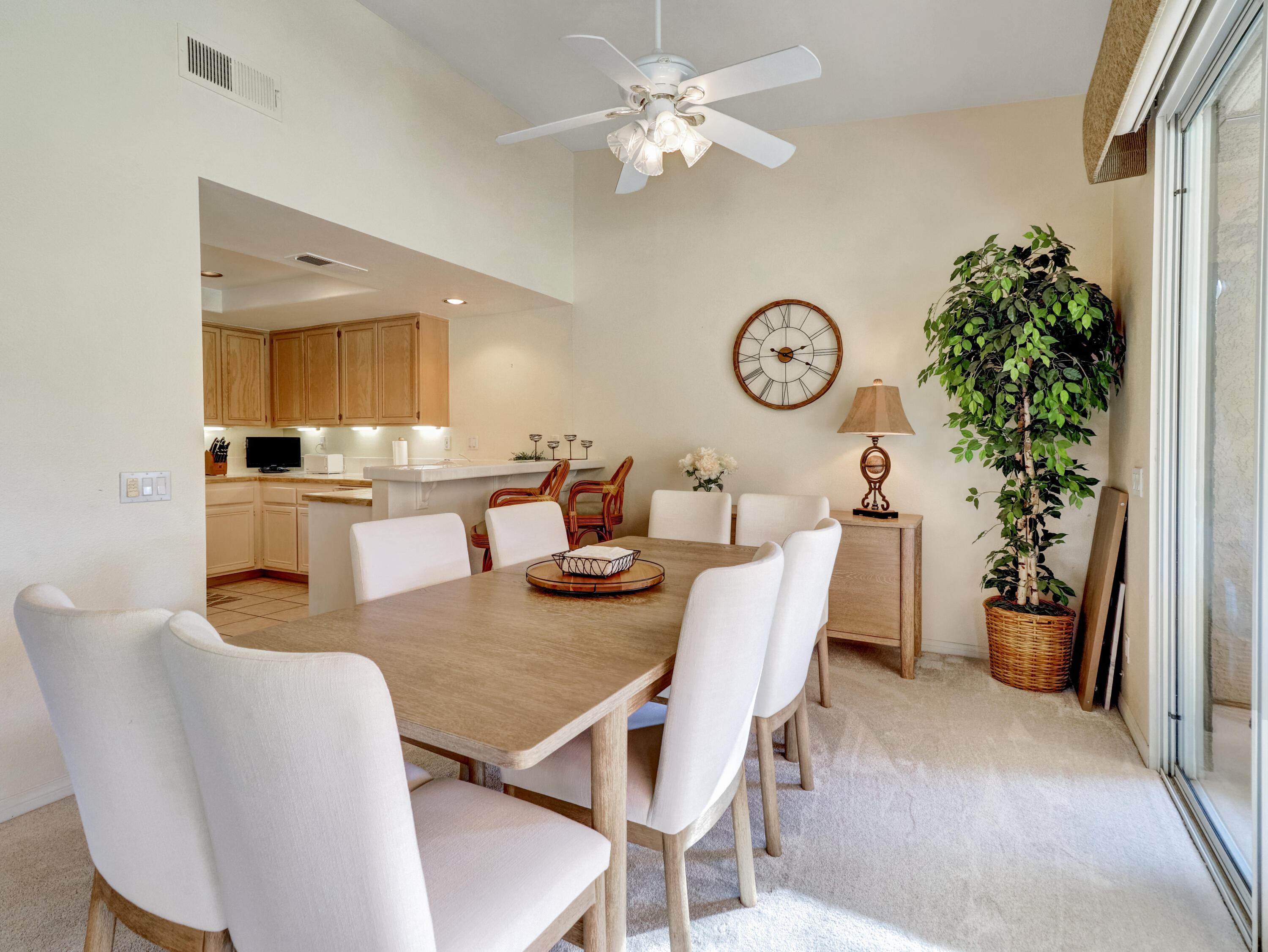 55393 Winged Foot La Quinta, CA 92253 - Photo 6 of 29 a view of a dining room with furniture window and wooden floor