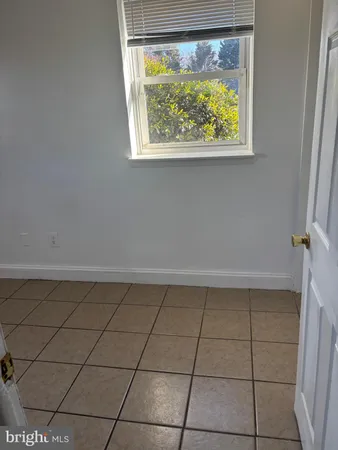 a view of a room with a window