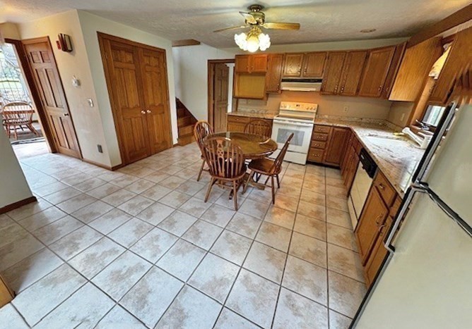 29 Highland View Drive Sutton, MA 01590 - Photo 12 of 40 a view of a dining room with furniture