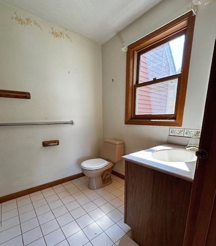 29 Highland View Drive Sutton, MA 01590 - Photo 18 of 40 a bathroom with a sink a toilet and mirror