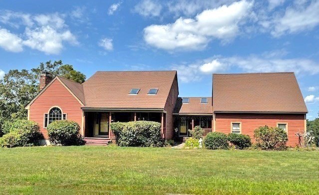 29 Highland View Drive Sutton, MA 01590 - Photo 2 of 40 a front view of a house with a yard