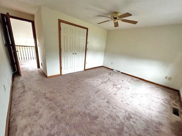 29 Highland View Drive Sutton, MA 01590 - Photo 25 of 40 an empty room with a fan & a ceiling fan
