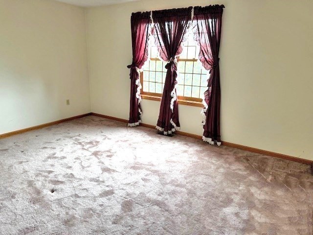 29 Highland View Drive Sutton, MA 01590 - Photo 27 of 40 an empty room with windows
