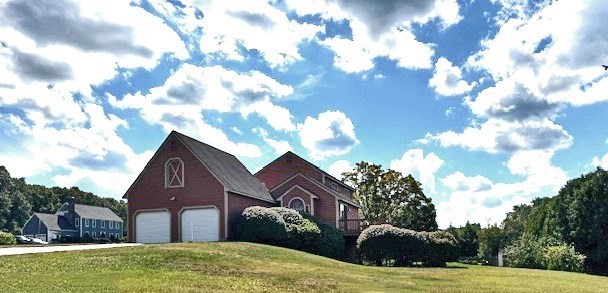 29 Highland View Drive Sutton, MA 01590 - Photo 30 of 40 a view of a house with a yard