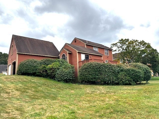 29 Highland View Drive Sutton, MA 01590 - Photo 31 of 40 a brick house with a yard