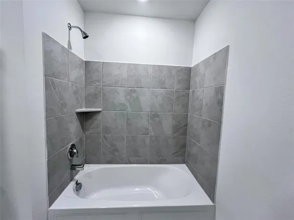 a bathroom with a bathtub