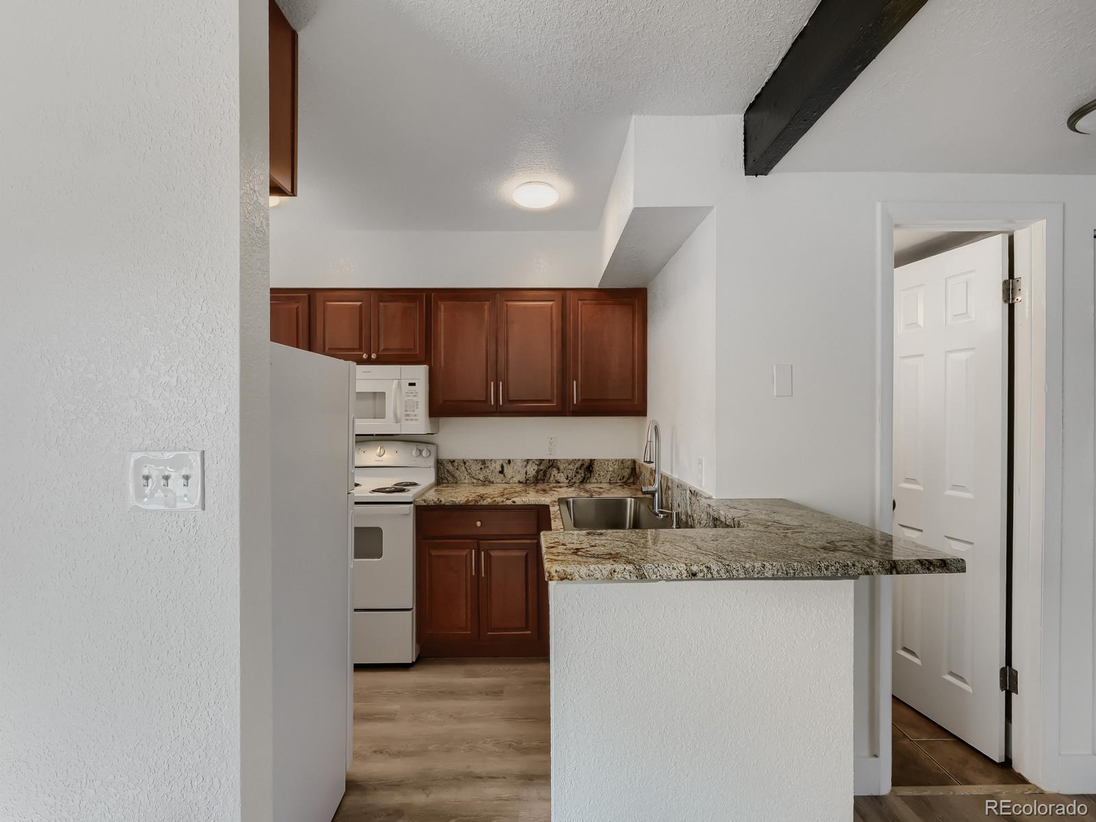1705 Heatheridge Road, Unit 102 Fort Collins, CO 80526 - Photo 4 of 26