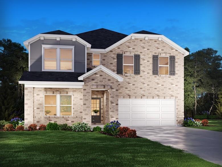 7267 Lyric Street Fairburn, GA 30213 - Photo 1 of 1 a front view of a house with a yard