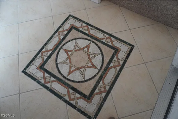 a view of staircase with a metal railing and a sink