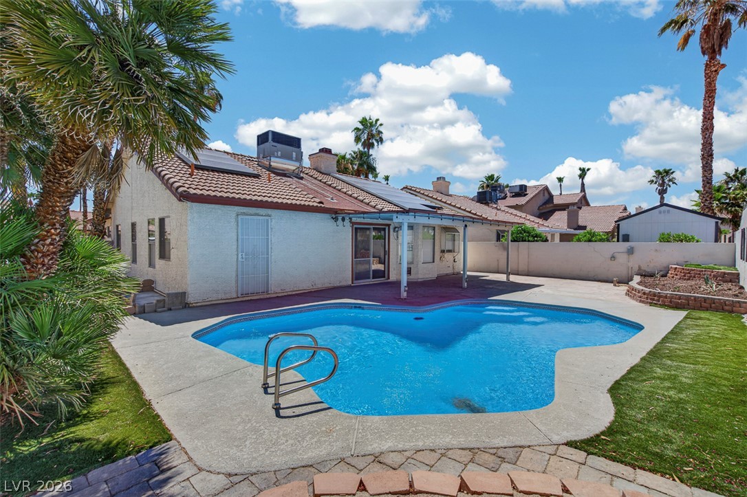 2609 Shakespeare Road Las Vegas, NV 89108 - Photo 1 of 41 A private swimming pool and patio provide a refreshing outdoor oasis.