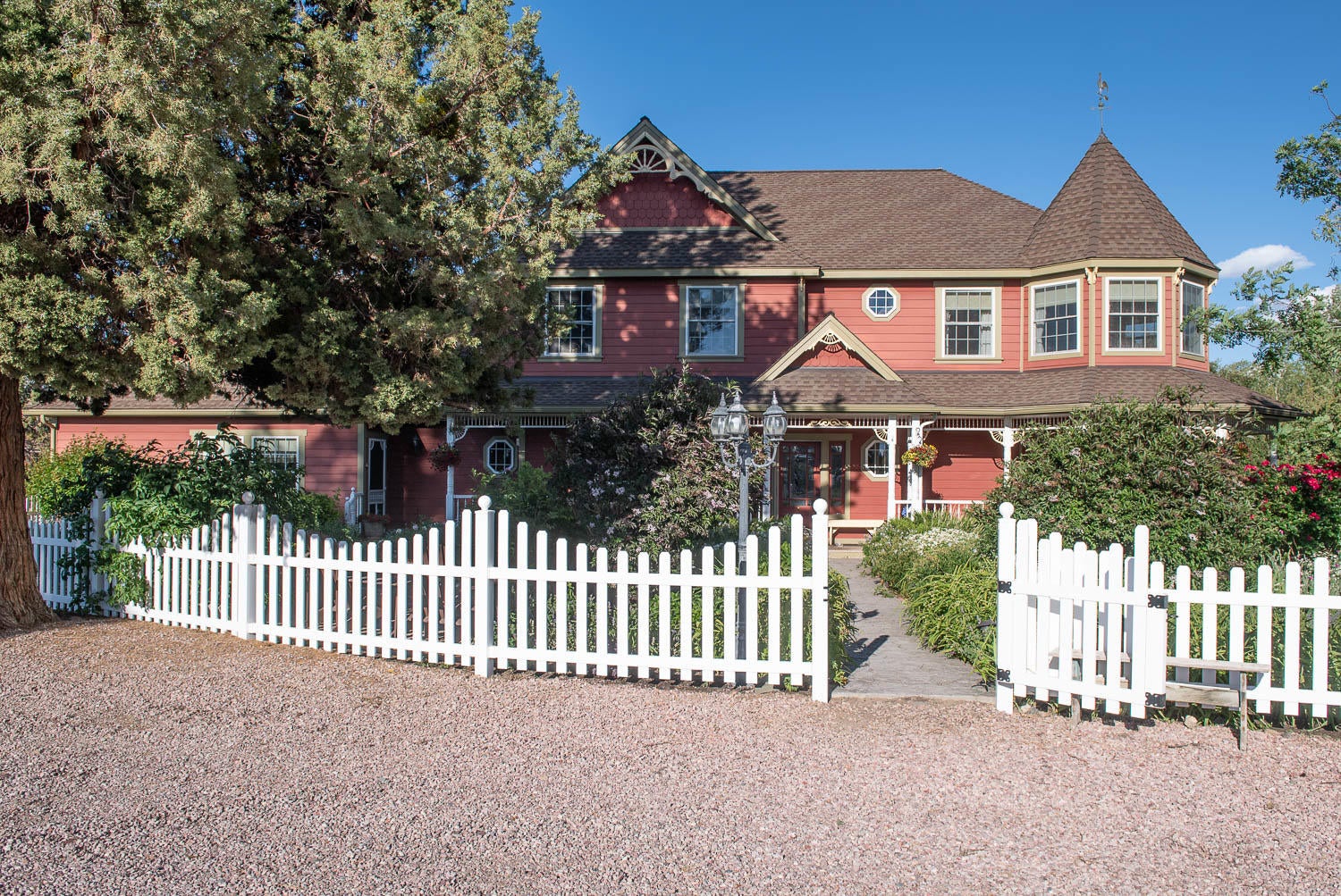 Enter through garden gate into cottage garden to front porch