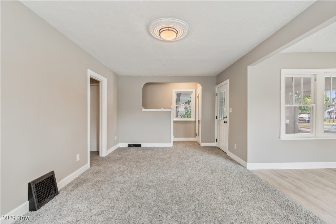 451 West Waterloo Road Akron, OH 44314 - Photo 4 of 27 Spare room featuring light carpet