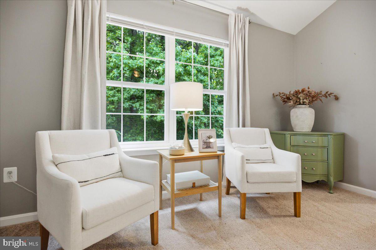 2424 Springbrook Court Huntingtown, MD 20639 - Photo 50 of 103 a living room with furniture and a window