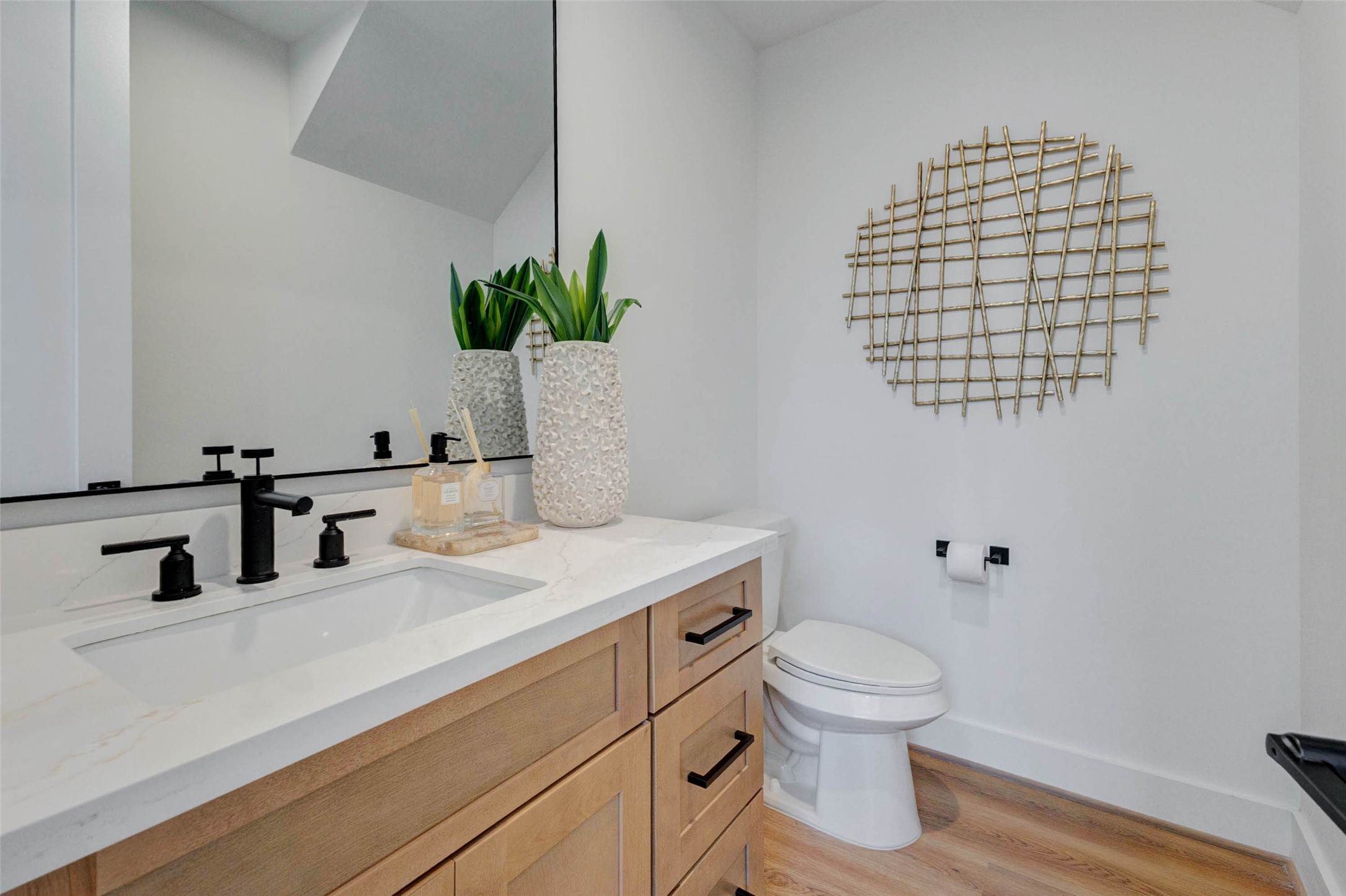 3309 St Emanuel Street Houston, TX 77004 - Photo 23 of 47 First-floor half bath with modern fixtures and stylish decor.