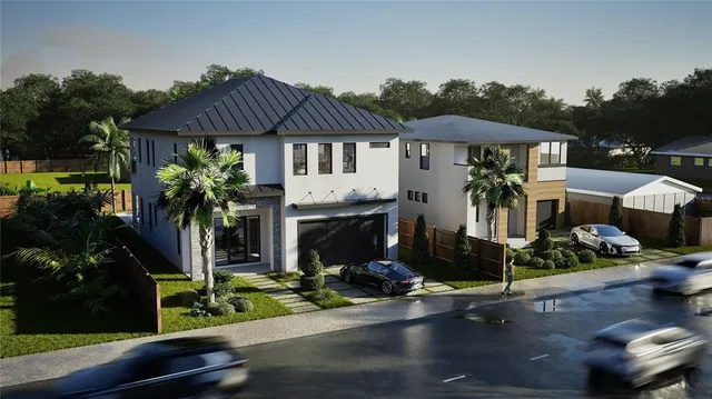 a front view of house with yard and outdoor seating