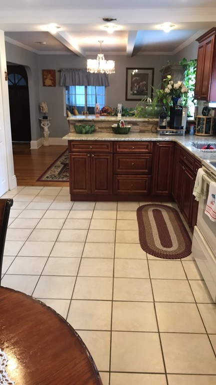 104-106 Milton Street Springfield, MA 01151 - Photo 4 of 17 a kitchen with a sink and cabinets