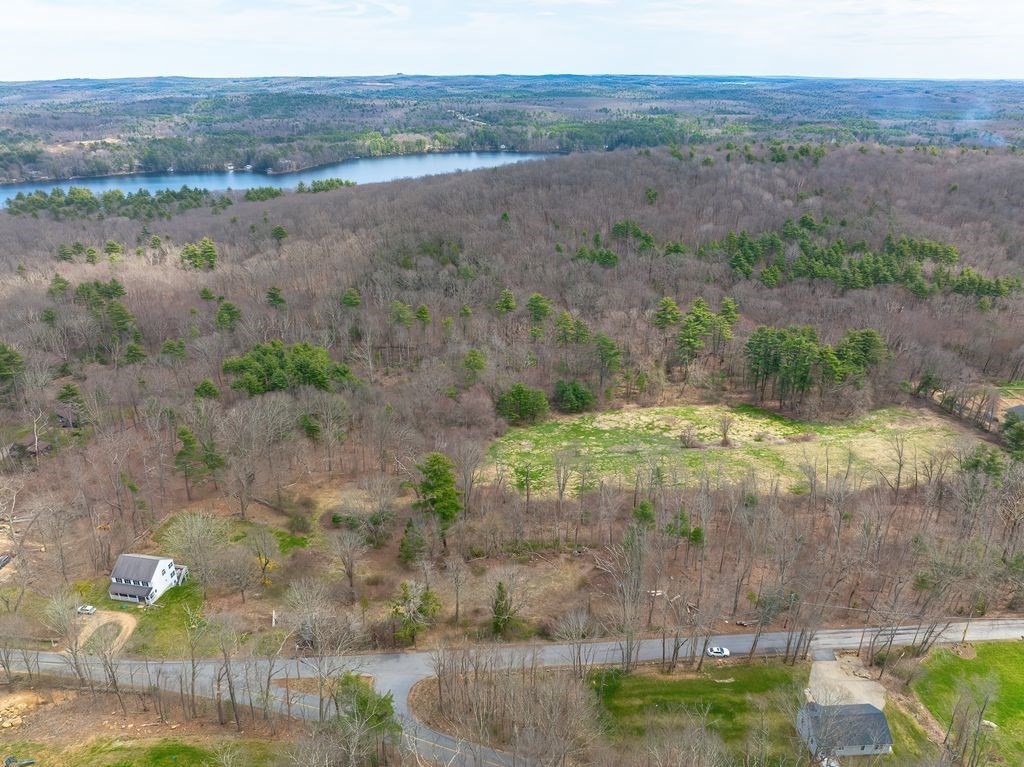 2 Gay Road Brookfield, MA 01506 - Photo 1 of 4 a view of a lake with a mountain in the background