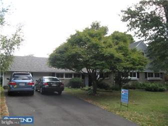6 Firtree Road Levittown, PA 19056 - Photo 1 of 12 a view of a car parked in front of a house
