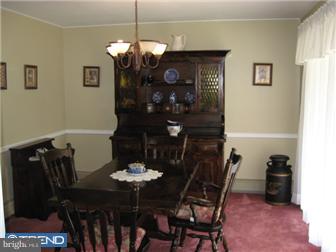 6 Firtree Road Levittown, PA 19056 - Photo 5 of 12 a view of a dining room with furniture and chandelier
