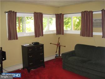 6 Firtree Road Levittown, PA 19056 - Photo 9 of 12 a living room with furniture and a window