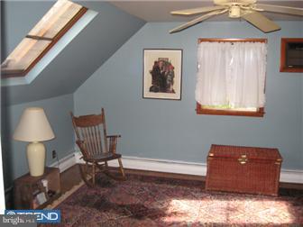 6 Firtree Road Levittown, PA 19056 - Photo 10 of 12 a room with furniture and a window