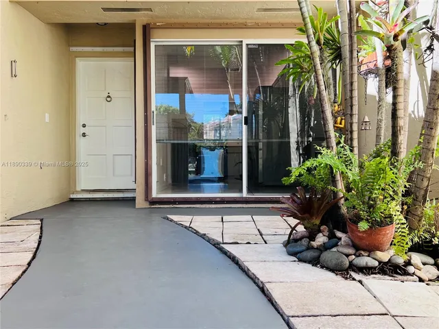 a view of a entryway door front of house