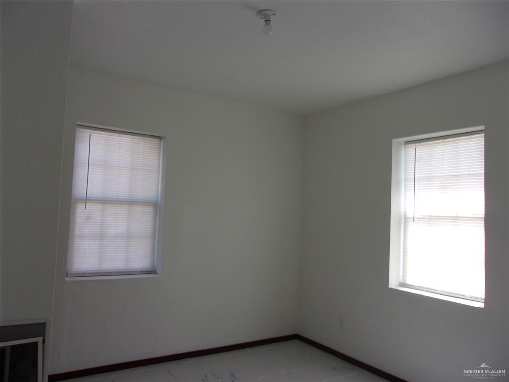 5 Mile Line Road Mission, TX 78573 - Photo 4 of 9 an empty room with a window