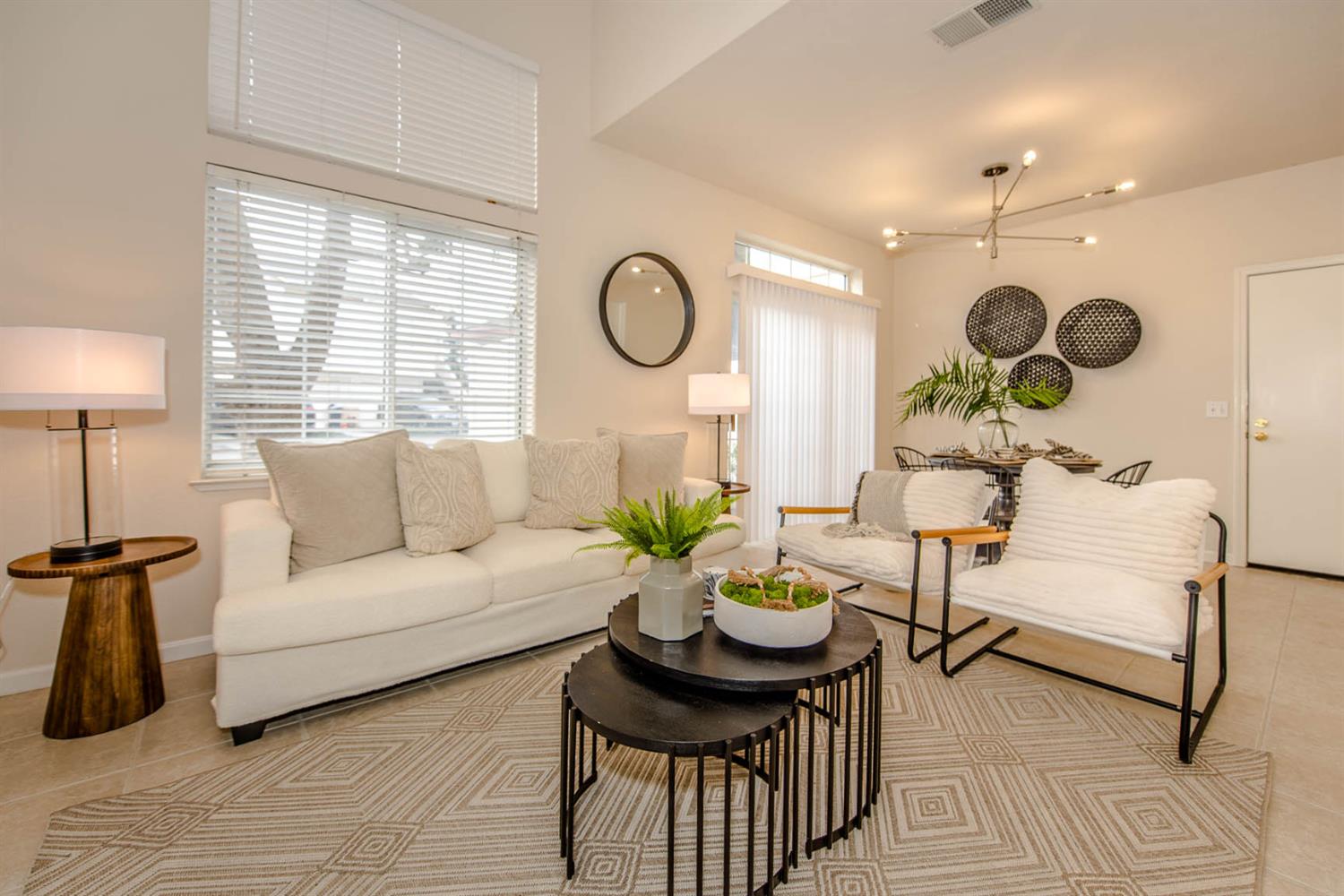 1107 Greene Terrace Davis, CA 95618 - Photo 4 of 28 a living room with furniture a chandelier and a window