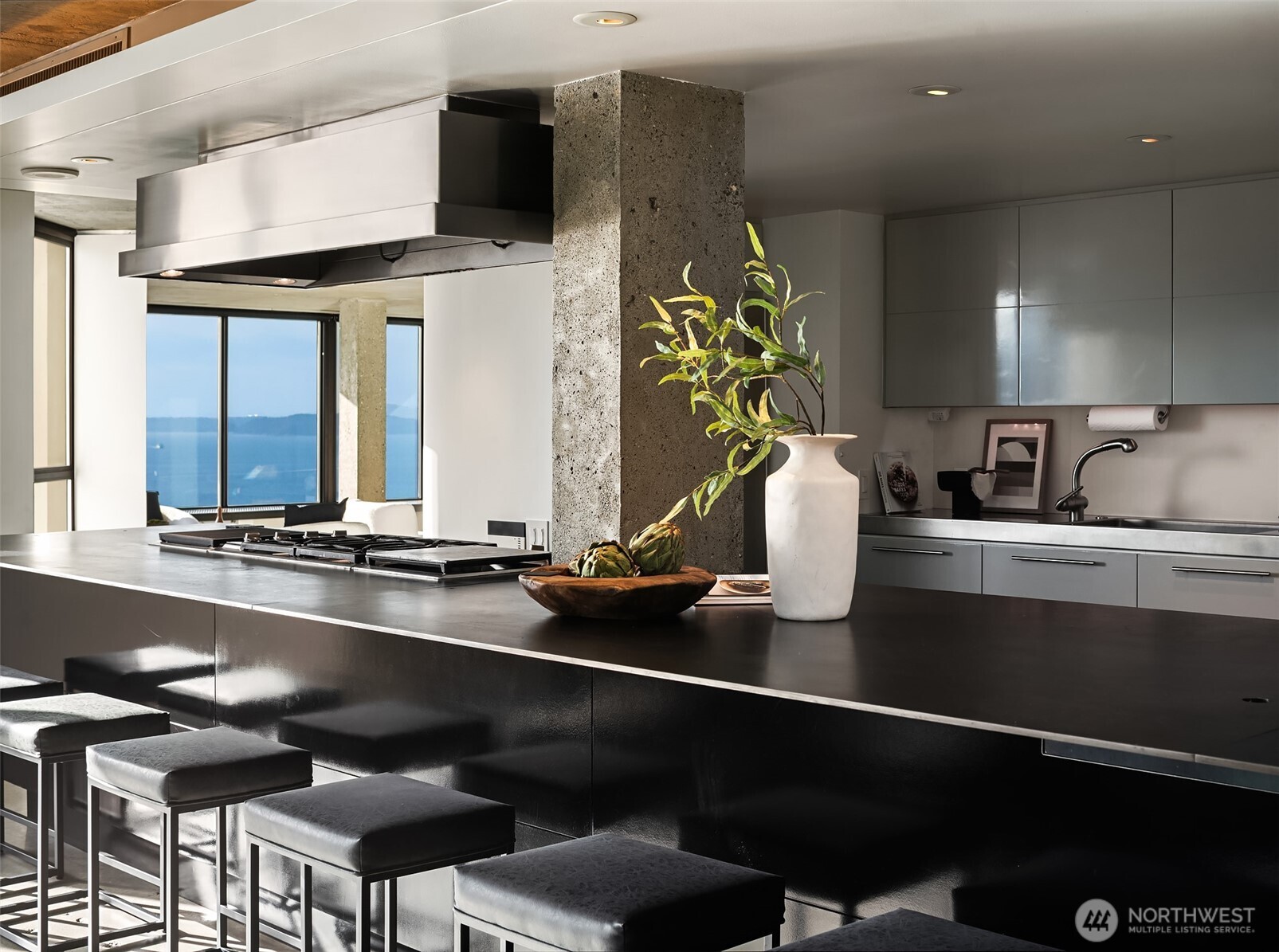 a kitchen with a table and chairs in it