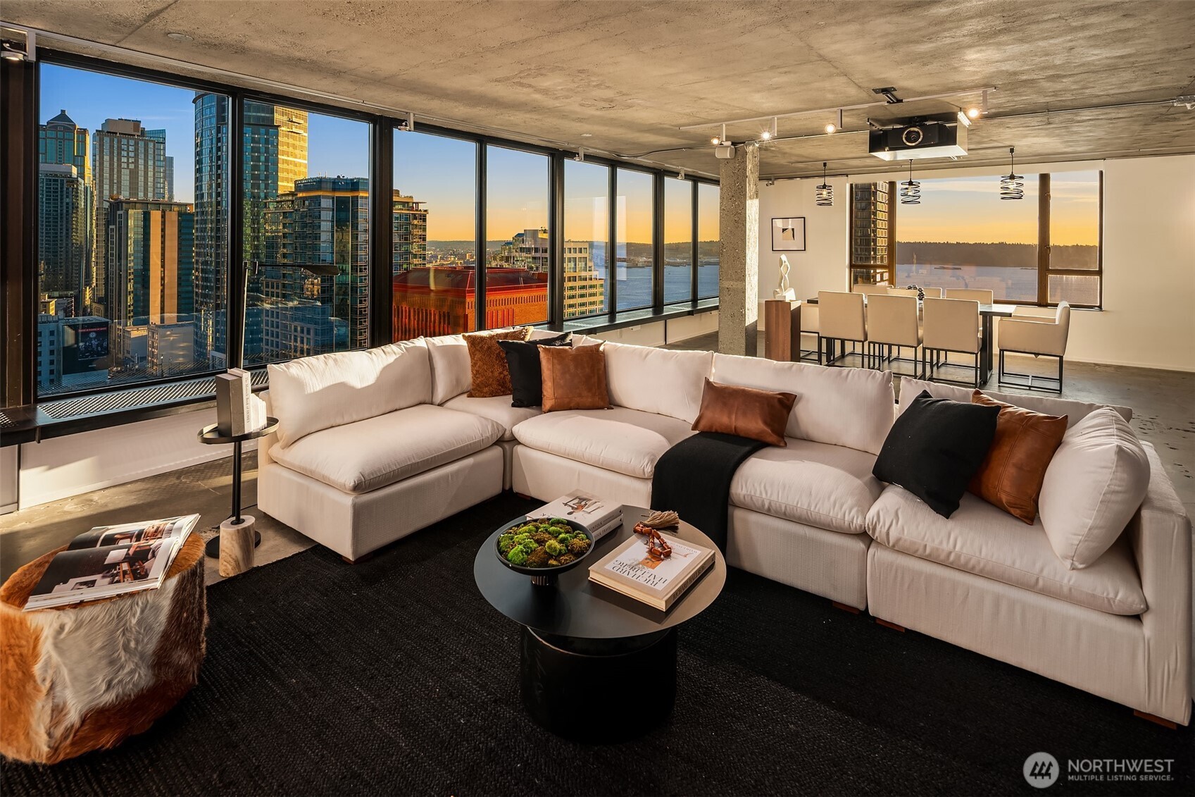 2201 3rd Avenue, Unit 2601 Seattle, WA 98121 - Photo 11 of 40 a living room with furniture and a floor to ceiling window
