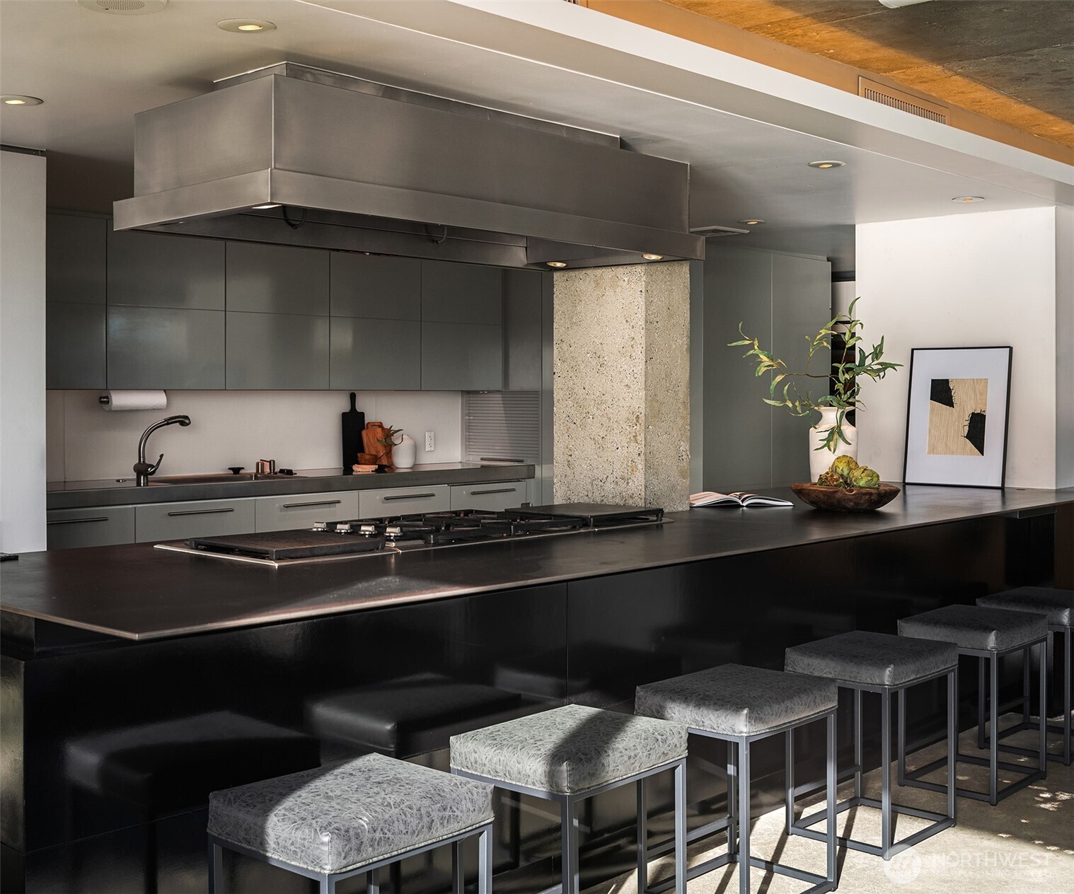 2201 3rd Avenue, Unit 2601 Seattle, WA 98121 - Photo 15 of 40 a kitchen with a table and chairs in it