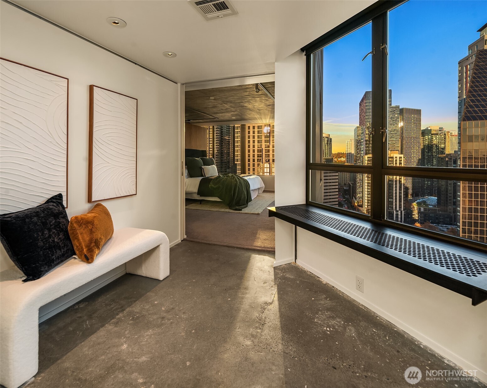 2201 3rd Avenue, Unit 2601 Seattle, WA 98121 - Photo 20 of 40 a living room with furniture and a gate