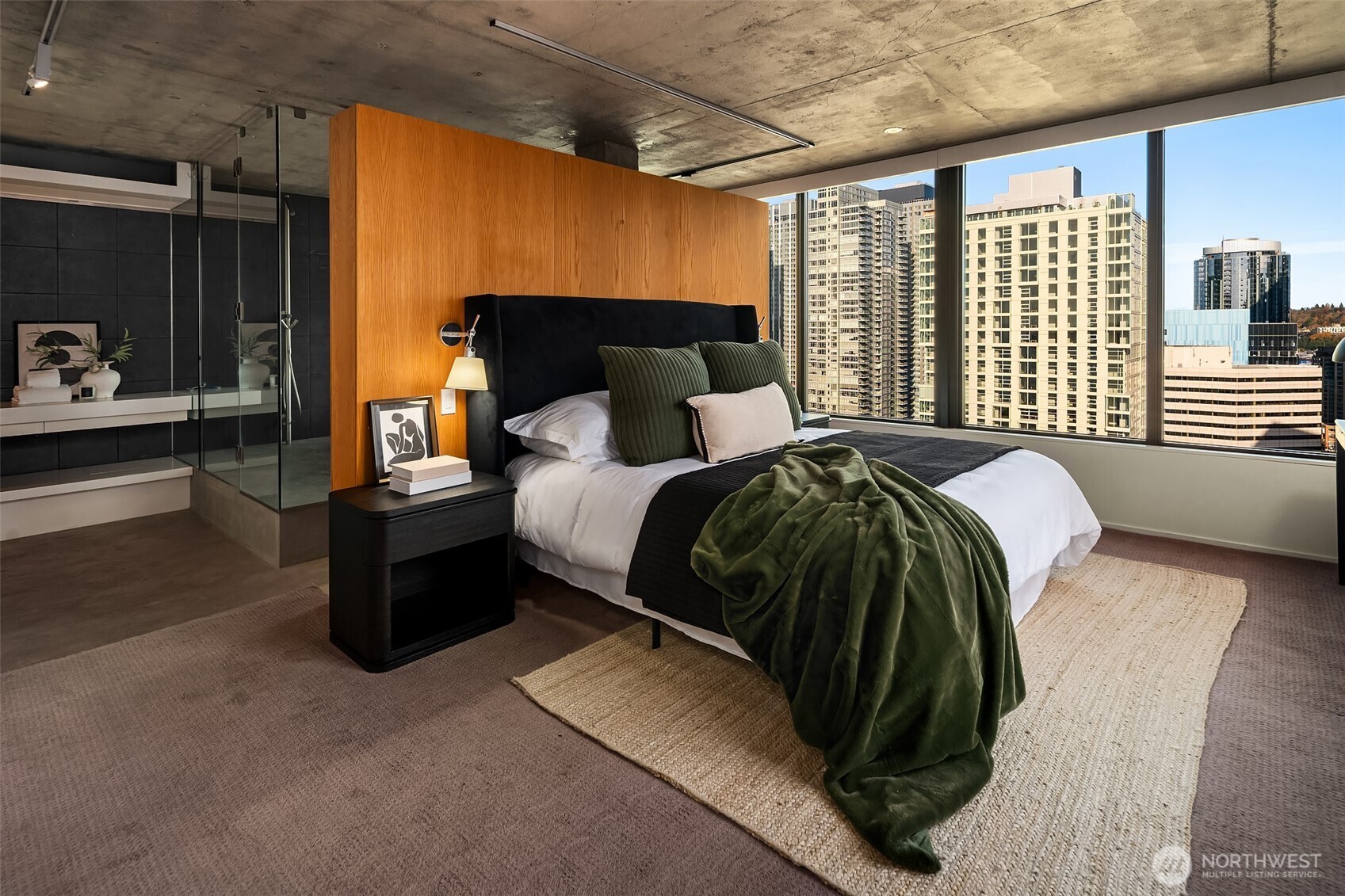 2201 3rd Avenue, Unit 2601 Seattle, WA 98121 - Photo 21 of 40 a bedroom with a bed and a window