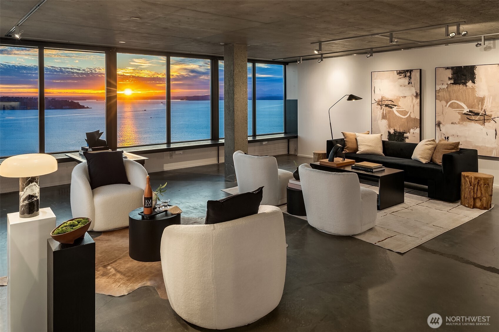 2201 3rd Avenue, Unit 2601 Seattle, WA 98121 - Photo 5 of 40 a living room with furniture and large windows