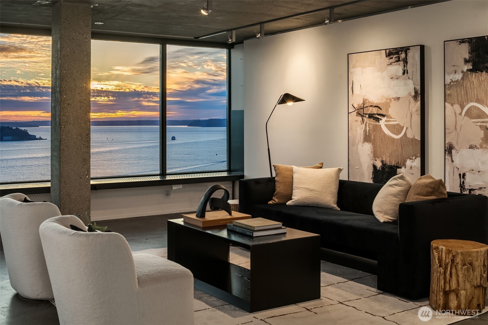 2201 3rd Avenue, Unit 2601 Seattle, WA 98121 - Photo 6 of 40 a living room with furniture and a large window