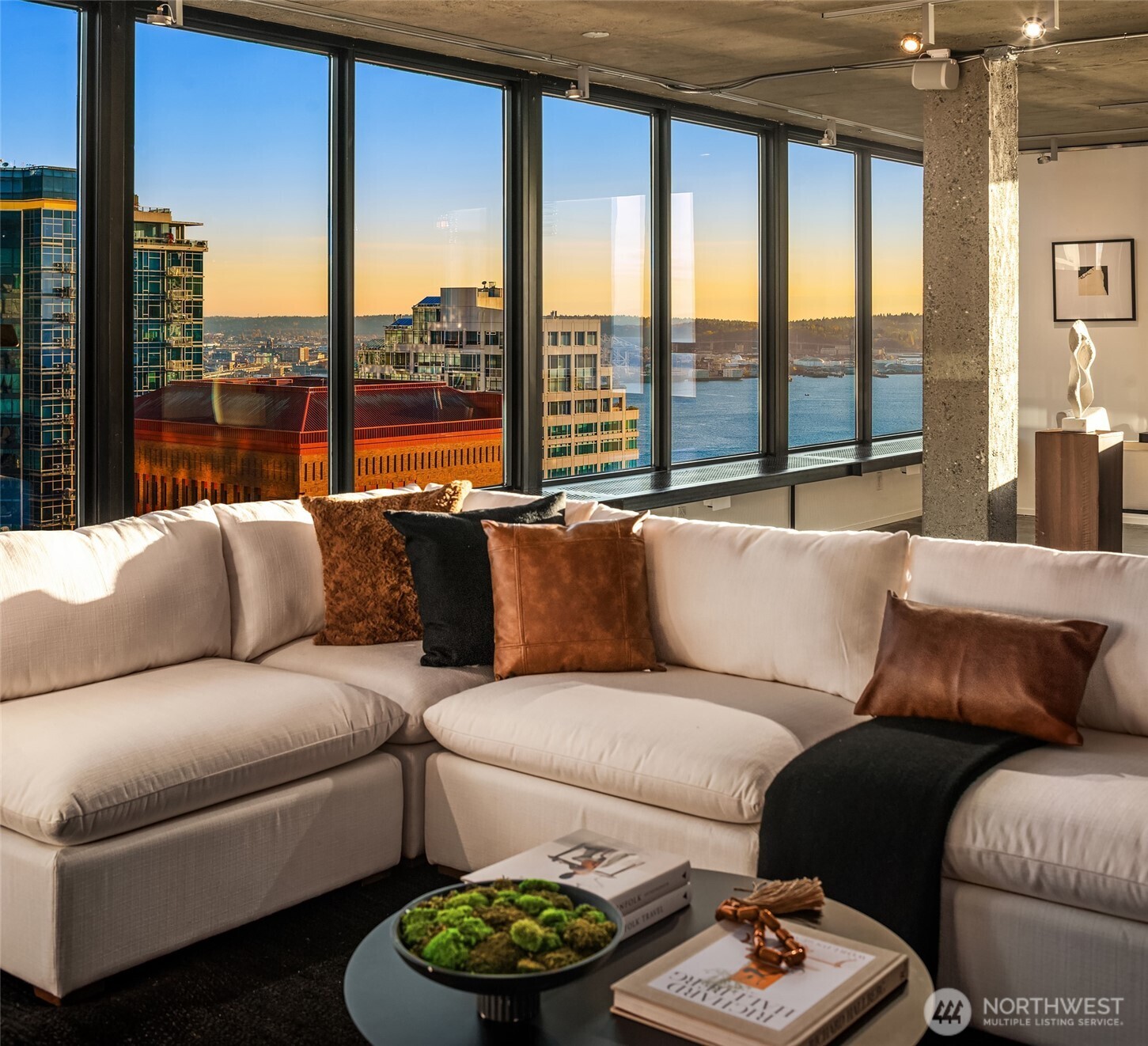 2201 3rd Avenue, Unit 2601 Seattle, WA 98121 - Photo 9 of 40 a living room with furniture and a large window