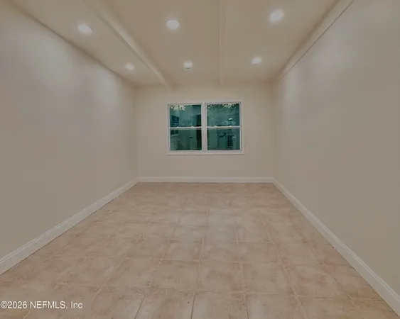 an empty room with a window