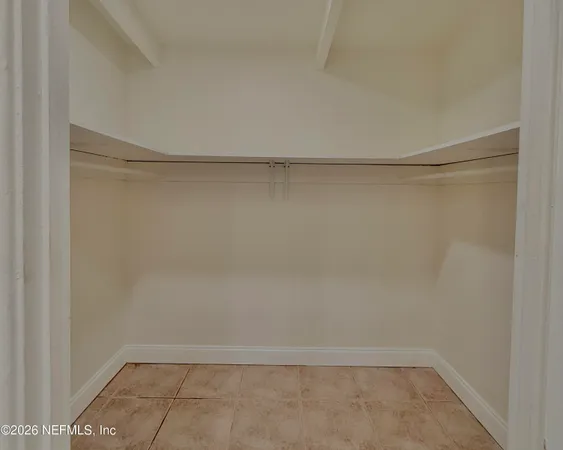 a bathroom with a bathtub and a sink
