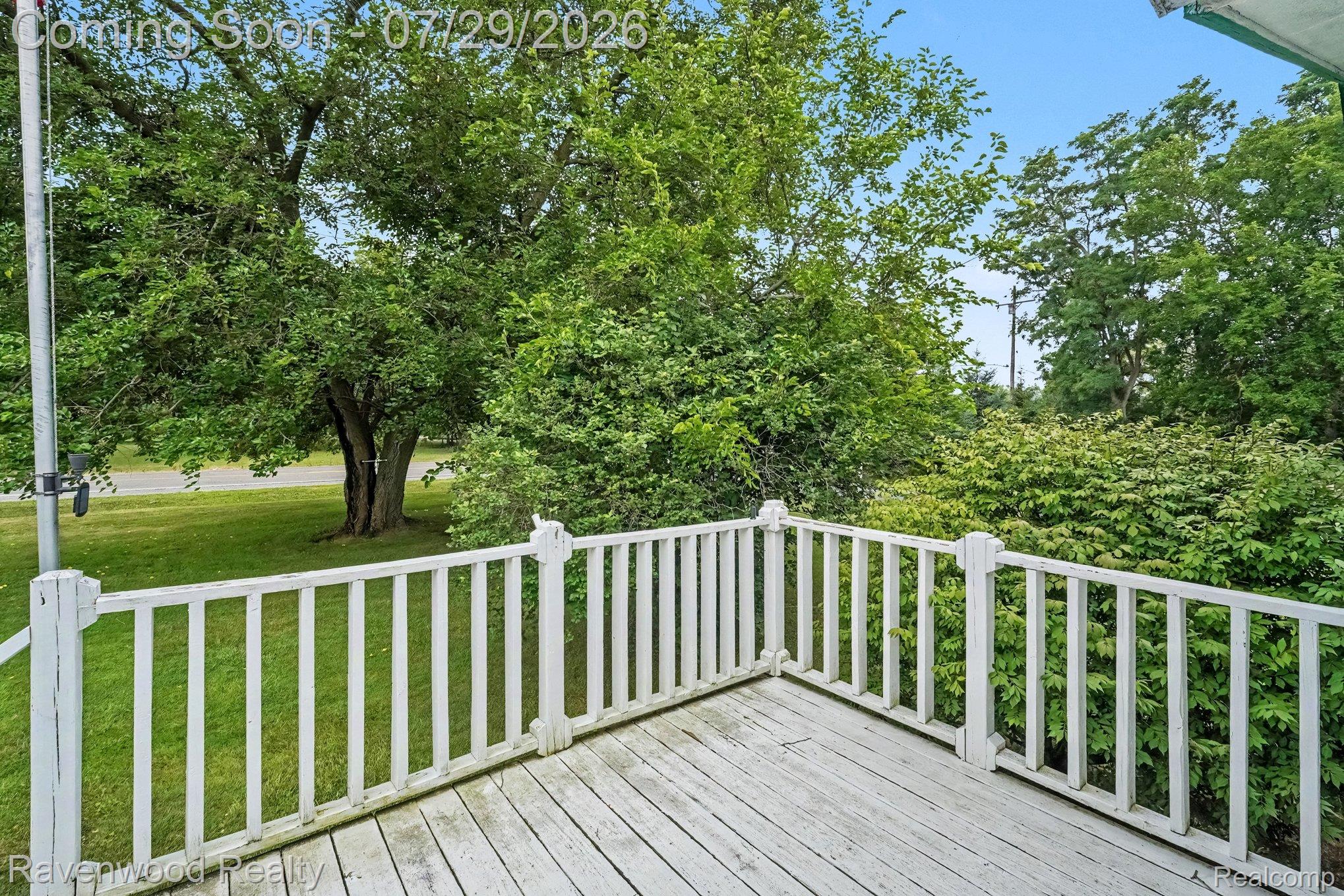 6317 East Coldwater Road Flint, MI 48506 - Photo 19 of 29 Outdoor deck featuring white painted wood flooring and white painted wood railings