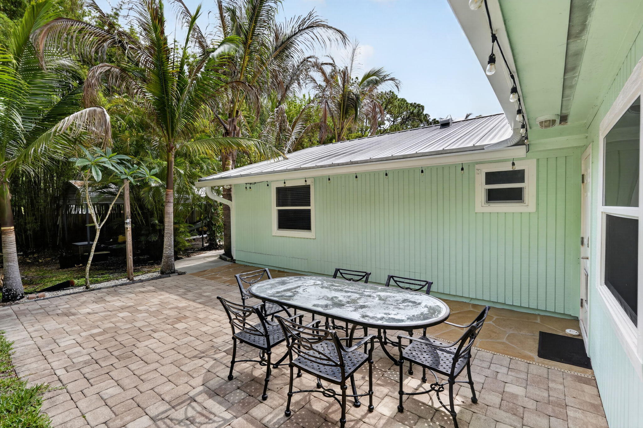 17391 Alexander Run Jupiter, FL 33478 - Photo 43 of 55 a view of a backyard with furniture and tub