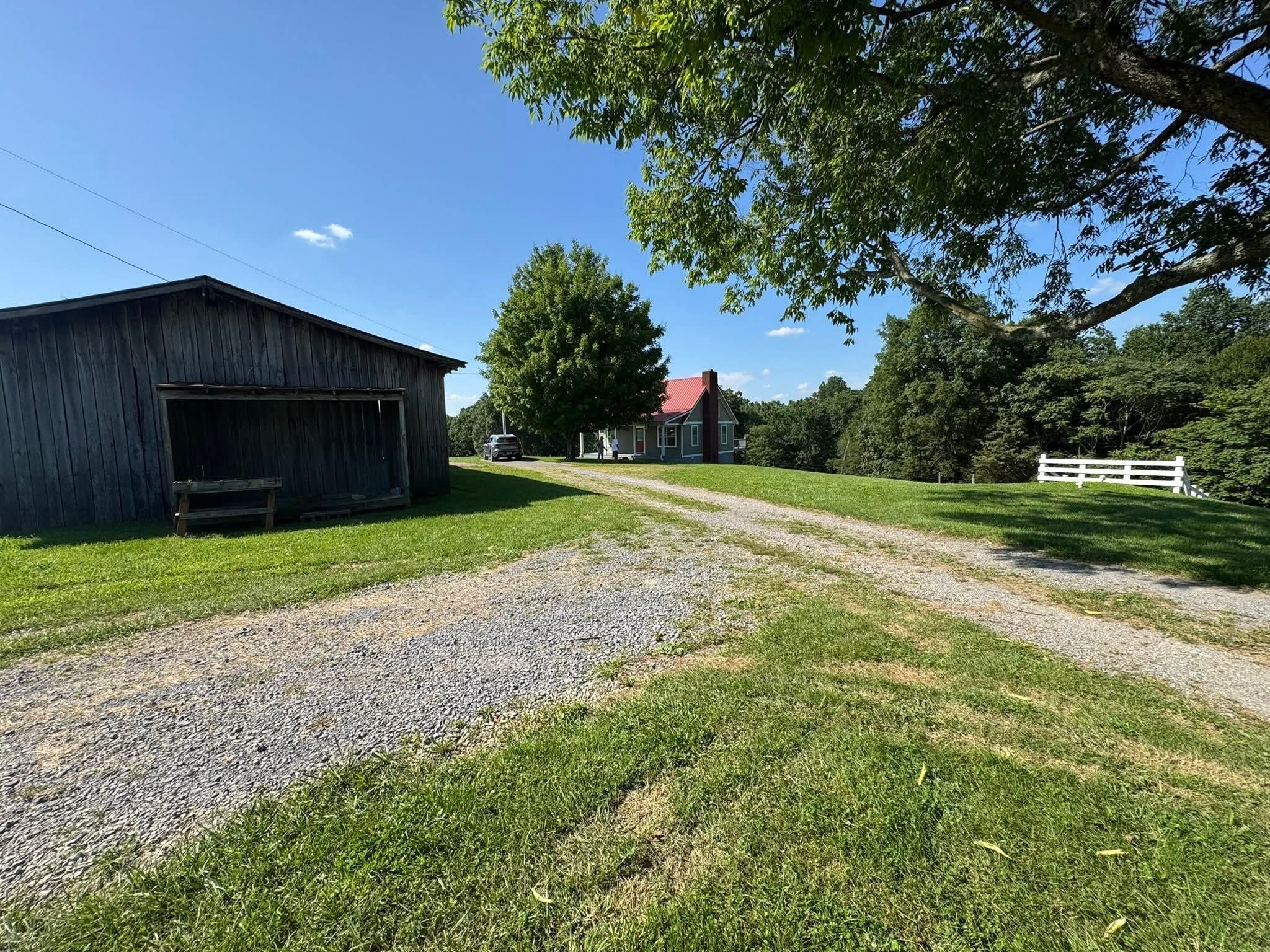 412 Hawkins Road Westmoreland, TN 37186 - Photo 6 of 20 a view of a backyard of the house